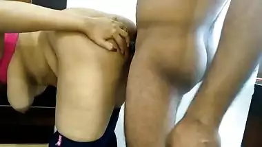 Man puts on a condom to fuck Desi's XXX slit from behind and cum on ass