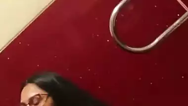 Chubby girl gives an outdoor blowjob in a cinema theatre