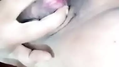 Small-tittied Desi girl with nose piercing likes to film porn videos