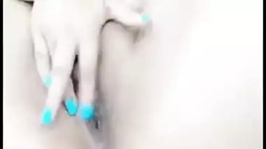 Sweet Pakistani babe fingers her wet Desi pussy till XXX orgasm