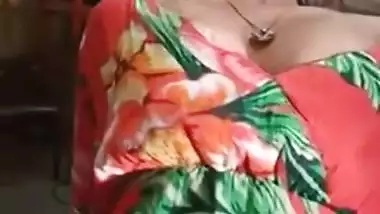 Staggering Desi porn girl in floral dress climbs the glass table