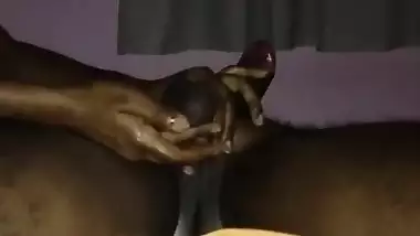 She massages and controls his dick and balls...