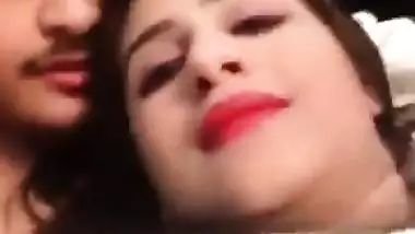 Sexy blue film of a horny young couple having fun in a hotel room