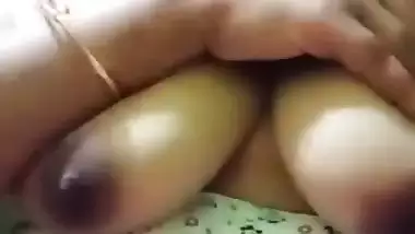 Cute girl opens bra to show sexy boobs to lover